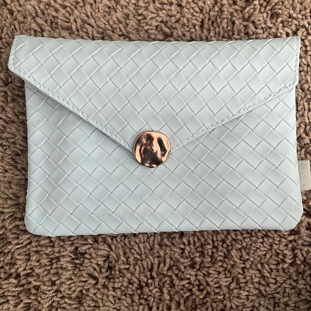 ipsy light blue cosmetic bag